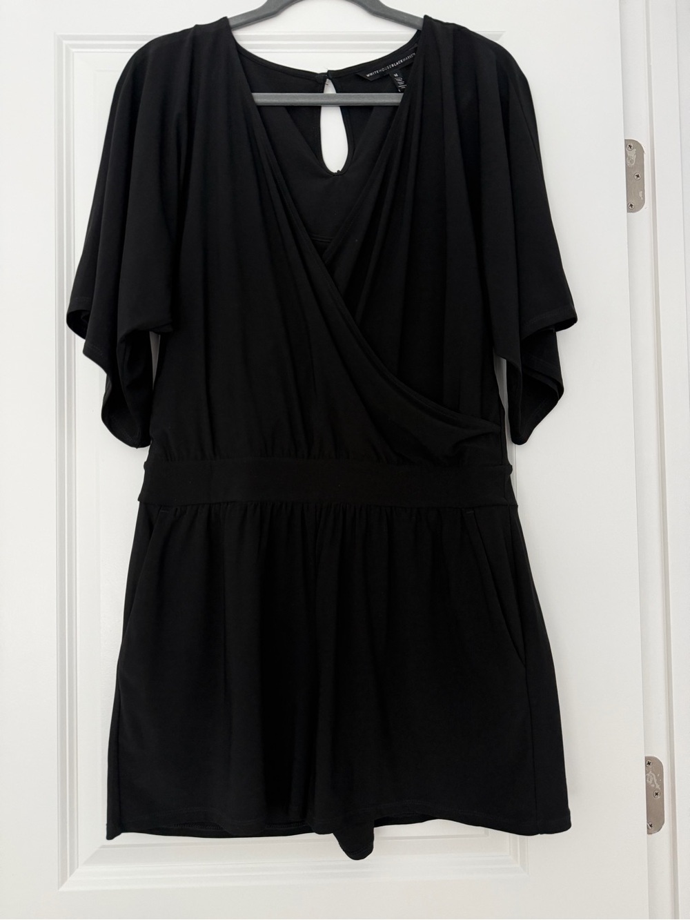 White House Black Market Black Surplice Romper with Flutter Sleeves